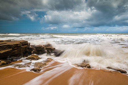 Waves Crashing Against Coquina Rocks Beach Washington Oaks FL